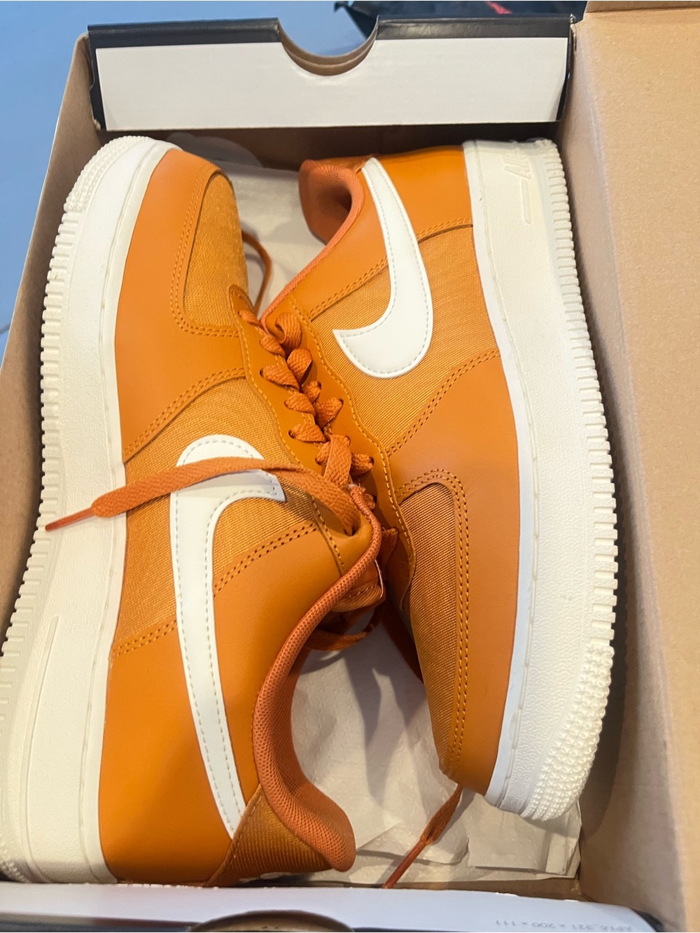 Like New Nike Orange Low-Top Sneakers with White Swoosh size 8.5.
